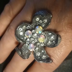 Expandable statement ring opalescent crystals. Large blackened flower.